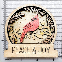 Load image into Gallery viewer, Cardinal Snow Globe Style Layered Wooden Ornament – Hand-Stained Holiday Decoration
