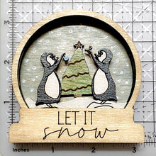 Load image into Gallery viewer, Penguins in Snow, wood snow globe style ornament, made in USA
