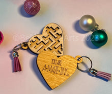 Load image into Gallery viewer, Valentine&#39;s Day gift, heart-shaped wooden maze puzzle with metal bead and clear acrylic top, with attached metal ring and colorful tassel by @belcreativearts
